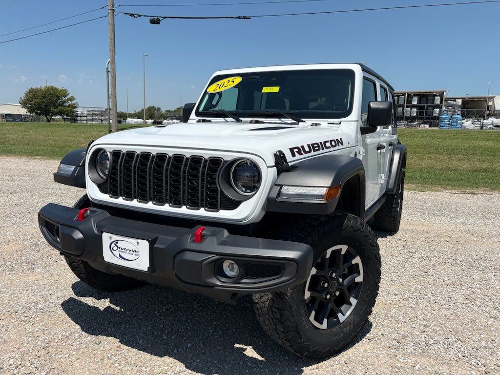 2025 Jeep Wrangler Rubicon in Bright White Cl — front three-quarter view