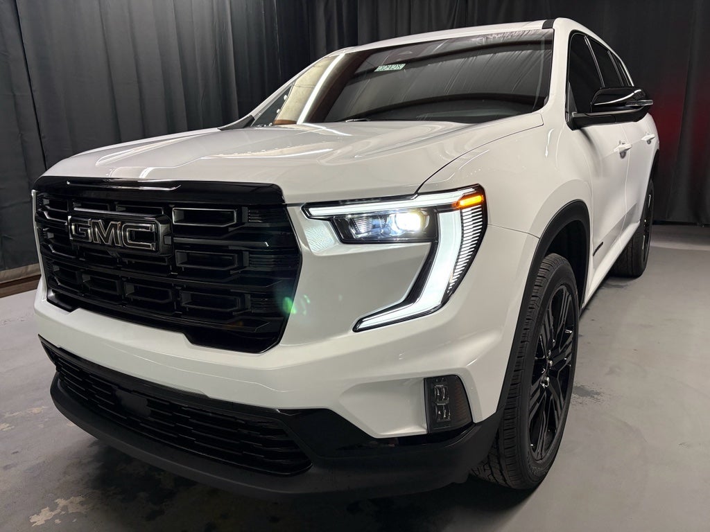 2026 GMC Acadia Elevation in Summit White — front three-quarter view