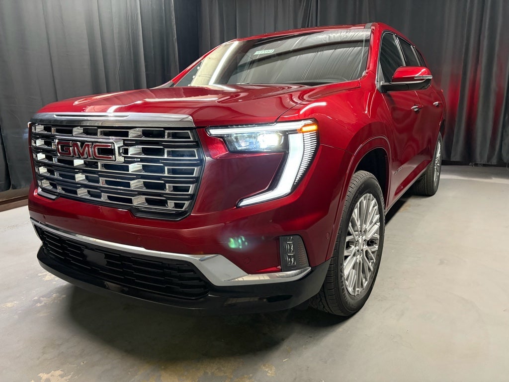 2026 GMC Acadia Denali in Volcanic Red Tintcoat — front three-quarter view