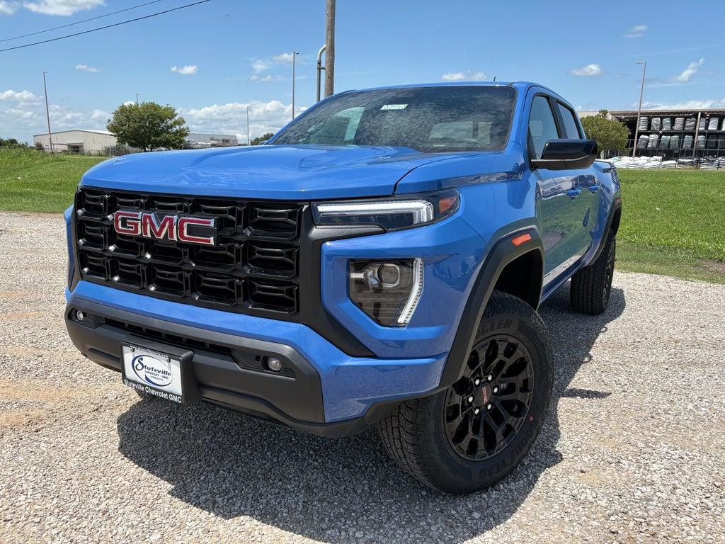 2026 GMC Canyon Elevation in Rapids Metallic — front three-quarter view