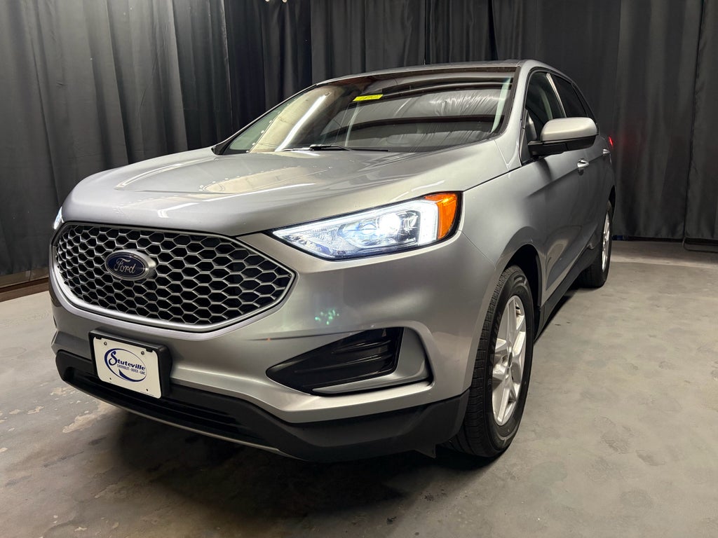 2024 Ford Edge SEL in Iconic Silver — front three-quarter view