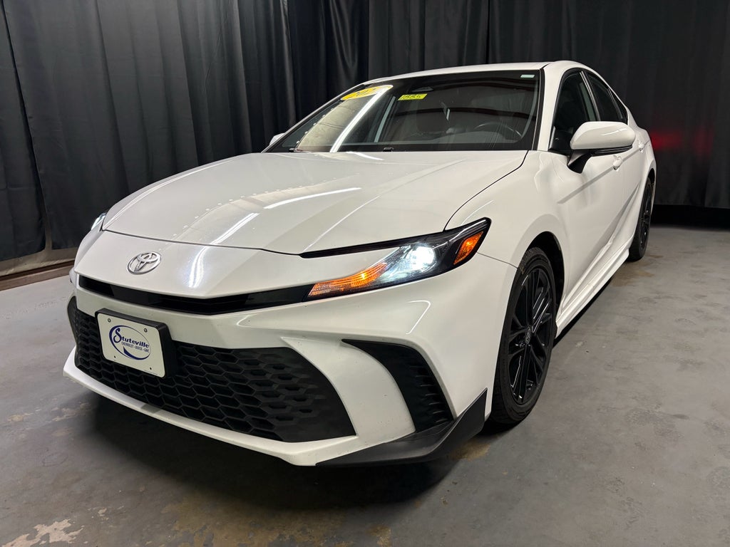 2025 Toyota Camry LE in Ice Cap — front three-quarter view