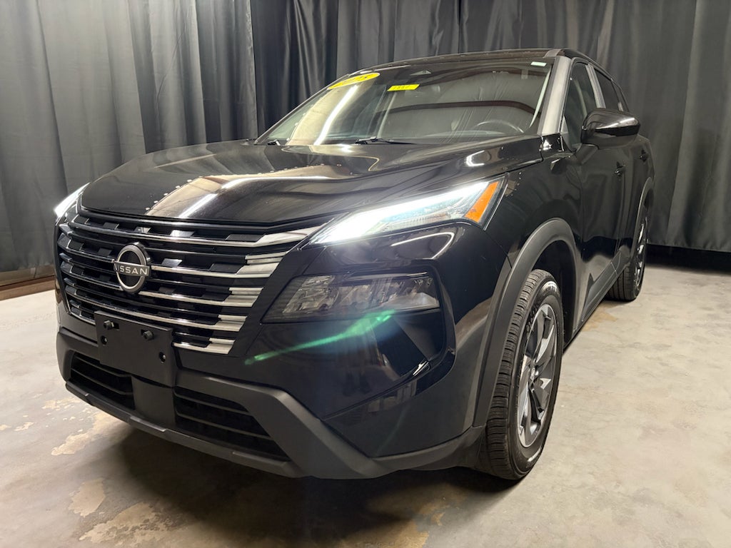 2025 Nissan Rogue SV in Super Black — front three-quarter view