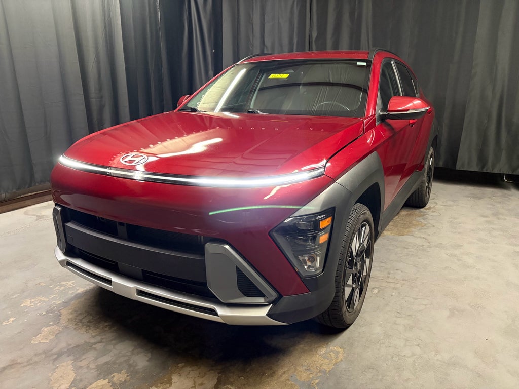 2025 Hyundai Kona SEL in Ultimate Red Me — front three-quarter view